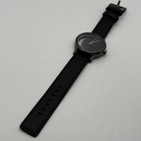 TOMI transparent dial with black leather strap